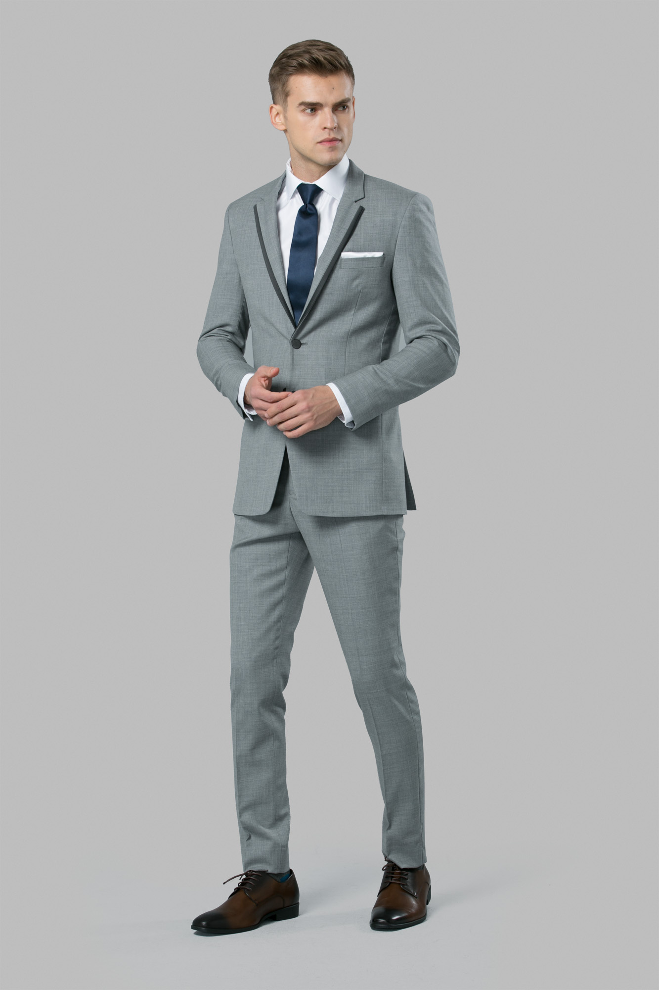 light gray tux with brown shoes